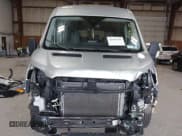 ✅ 2021 Ford Transit Passenger XL • VIN: 1FBAX9CG9MKA15625 • Лот: 42491429. Опубликован ранее на IAAI с пробегом 99 401 миль. Бесплатный доступ к архиву аукционных продаж из США и подробный отчёт об истории автомобиля на DreamBid. Изображение 6.