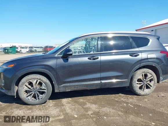 ✅ 2020 Hyundai Santa Fe Limited • VIN: 5NMS5CAA0LH208063 • Лот: 42131296. Опубликован ранее на IAAI с пробегом 65 030 миль. Бесплатный доступ к архиву аукционных продаж из США и подробный отчёт об истории автомобиля на DreamBid. Изображение 14.