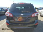 ✅ 2012 Hyundai Santa Fe GLS • VIN: 5XYZGDAB4CG114253 • Lot: 73595404. Listed on Copart with 111,190 mi. Free auction sales archive from the USA and detailed vehicle history report at DreamBid. Image 6.