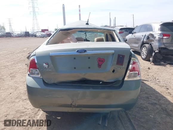 ✅ 2009 Ford Fusion SEL • VIN: 3FAHP08Z19R170808 • Лот: 43352259. Опубликован ранее на IAAI с пробегом 111 141 миль. Бесплатный доступ к архиву аукционных продаж из США и подробный отчёт об истории автомобиля на DreamBid. Изображение 17.