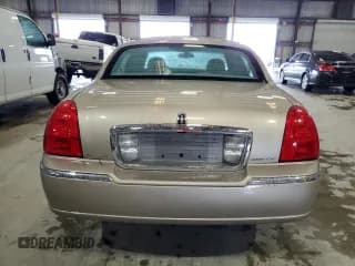 ✅ 2003 Lincoln Town Car Executive • VIN: 1LNHM81WX3Y696831 • Lot: 70990494. Listed on Copart with Not provided. Free auction sales archive from the USA and detailed vehicle history report at DreamBid. Image 6.