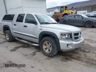 2009 Dodge Dakota z VIN 1D3HW78P99S805984, wystawiony jako IAAI lot #41798436 z przebiegiem 76 880 mil mil oraz . Historia ofert i sprzedaży dostępna na DreamBid. Obrazek 1.