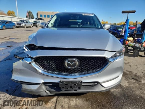 ✅ 2020 Mazda CX-5 Touring • VIN: JM3KFBCM8L1810080 • Lot: 90259945. Wystawiony na Copart z przebiegiem 57 139 mil. Bezpłatny archiwum sprzedaży aukcyjnych z USA i szczegółowy raport historii pojazdu na DreamBid. Zdjęcie 5.