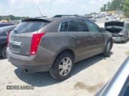 ✅ 2015 Cadillac SRX • VIN: 3GYFNAE35FS542016 • Лот: 42669025. Опубликован ранее на IAAI с пробегом 197 830 миль. Бесплатный доступ к архиву аукционных продаж из США и подробный отчёт об истории автомобиля на DreamBid. Изображение 4.