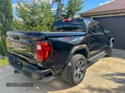 ✅ 2023 GMC Canyon 4WD AT4 • VIN: 1GTP6DEK5P1266181 • Лот: 90761935. Опубликован ранее на Copart с пробегом 11 764 миль. Бесплатный доступ к архиву аукционных продаж из США и подробный отчёт об истории автомобиля на DreamBid. Изображение 4.