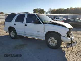 2000 Chevrolet Blazer LT z VIN 1GNDT13WXY2236550, wystawiony jako Copart lot #77170574 z przebiegiem 221 994 mil mil oraz Szkoda całkowita • Salvage title. Historia ofert i sprzedaży dostępna na DreamBid. Obrazek 4.
