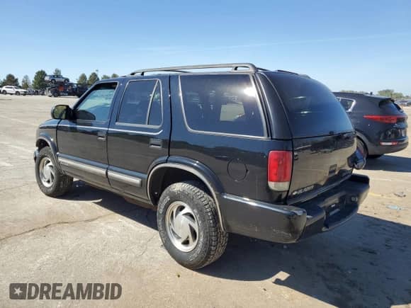 2001 Chevrolet Blazer LT с VIN 1GNDT13W112182576, выставлен на аукционе Copart как лот 74328974 с пробегом 117 751 миль миль и Списание • Salvage title. История ставок и продаж доступна на DreamBid. Изображение 2.