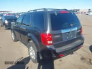 ✅ 2009 Mazda Tribute • VIN: 4F2CZ06G79KM04129 • Lot: 40843930. Listed on IAAI with 164,731 mi. Free auction sales archive from the USA and detailed vehicle history report at DreamBid. Image 3.