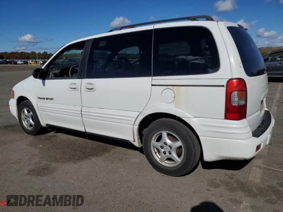 ✅ 1998 Pontiac Trans Sport • VIN: 1GMDU03E5WD315354 • Lot: 75705914. Wystawiony na Copart z przebiegiem 91 349 mil. Bezpłatny archiwum sprzedaży aukcyjnych z USA i szczegółowy raport historii pojazdu na DreamBid. Zdjęcie 2.