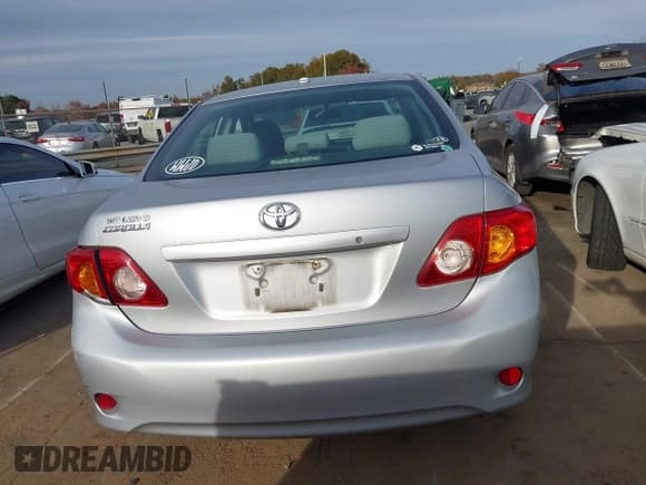 ✅ 2010 Toyota Corolla LE • VIN: 1NXBU4EE3AZ191749 • Lot: 43694527. Listed on IAAI with 141,196 mi. Free auction sales archive from the USA and detailed vehicle history report at DreamBid. Image 16.