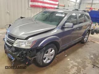 ✅ 2012 Dodge Journey SXT • VIN: 3C4PDCBG6CT145680 • Lot: 93367005. Wystawiony na Copart z przebiegiem 103 928 mil. Bezpłatny archiwum sprzedaży aukcyjnych z USA i szczegółowy raport historii pojazdu na DreamBid. Zdjęcie 1.