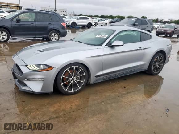2021 Ford Mustang EcoBoost with VIN 1FA6P8TH7M5137392, listed as a Copart auction lot 64767285 with 100,212 mi miles and Salvage title. Bid and sale history available at DreamBid. Image 1.