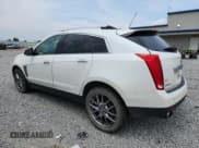 ✅ 2016 Cadillac SRX Premium Collection • VIN: 3GYFNDE39GS546265 • Lot: 65597945. Wystawiony na Copart z przebiegiem 145 591 mil. Bezpłatny archiwum sprzedaży aukcyjnych z USA i szczegółowy raport historii pojazdu na DreamBid. Zdjęcie 2.