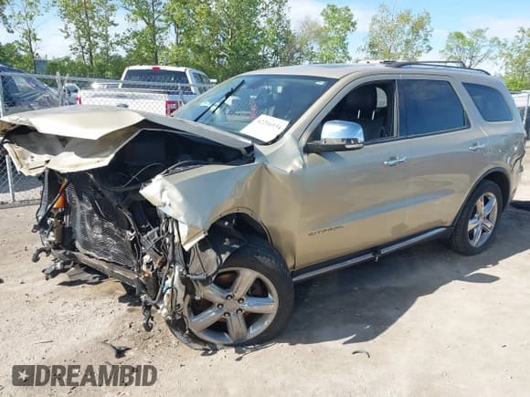 ✅ 2011 Dodge Durango Citadel • VIN: 1D4RE5GG3BC599473 • Lot: 42216934. Listed on IAAI with 151,418 mi. Free auction sales archive from the USA and detailed vehicle history report at DreamBid. Image 2.