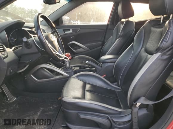 ✅ 2014 Hyundai Veloster Turbo • VIN: KMHTC6AE0EU199399 • Lot: 78369254. Wystawiony na Copart z przebiegiem 136 842 mil. Bezpłatny archiwum sprzedaży aukcyjnych z USA i szczegółowy raport historii pojazdu na DreamBid. Zdjęcie 7.