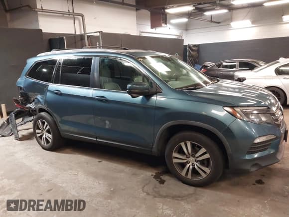 ✅ 2018 Honda Pilot EX-L • VIN: 5FNYF6H7XJB053927 • Лот: 40659757. Опубликован ранее на IAAI с пробегом 125 182 миль. Бесплатный доступ к архиву аукционных продаж из США и подробный отчёт об истории автомобиля на DreamBid. Изображение 13.