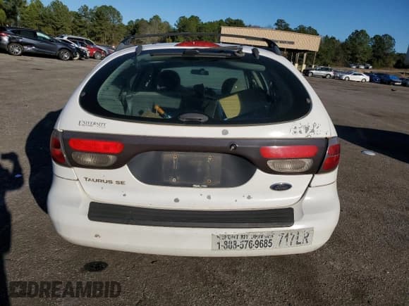 ✅ 2002 Ford Taurus SE Standard • VIN: 1FAFP58U52A144446 • Lot: 42825114. Listed on Copart with 182,653 mi. Free auction sales archive from the USA and detailed vehicle history report at DreamBid. Image 6.