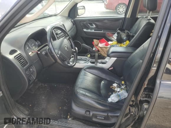 ✅ 2005 Mercury Mariner Luxury • VIN: 4M2YU57175DJ31939 • Лот: 54049415. Опубликован ранее на Copart с пробегом Не указан. Бесплатный доступ к архиву аукционных продаж из США и подробный отчёт об истории автомобиля на DreamBid. Изображение 7.