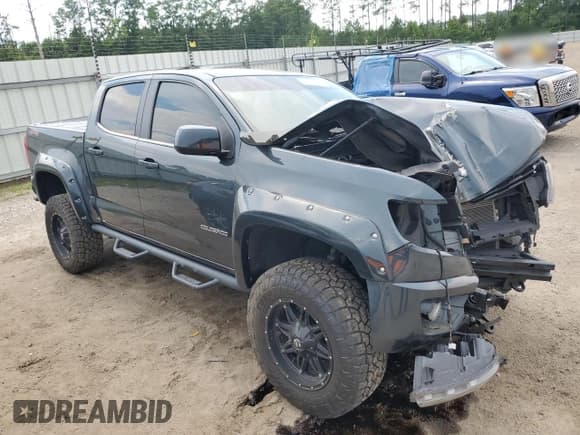 ✅ 2018 Chevrolet Colorado 4WD LT • VIN: 1GCGTCEN4J1245021 • Лот: 63141524. Опубликован ранее на Copart с пробегом 90 784 миль. Бесплатный доступ к архиву аукционных продаж из США и подробный отчёт об истории автомобиля на DreamBid. Изображение 4.