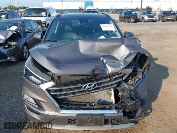 2020 Hyundai Tucson SEL z VIN KM8J3CAL1LU095232, wystawiony jako IAAI lot #42839790 z przebiegiem 90 834 mil mil oraz . Historia ofert i sprzedaży dostępna na DreamBid. Obrazek 13.