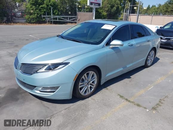 ✅ 2014 Lincoln MKZ Hybrid • VIN: 3LN6L2LU7ER808117 • Lot: 43097766. Listed on IAAI with 104,542 mi. Free auction sales archive from the USA and detailed vehicle history report at DreamBid. Image 2.