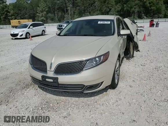 ✅ 2015 Lincoln MKS • VIN: 1LNHL9DK3FG605670 • Lot: 87386755. Wystawiony na Copart z przebiegiem 158 991 mil. Bezpłatny archiwum sprzedaży aukcyjnych z USA i szczegółowy raport historii pojazdu na DreamBid. Zdjęcie 13.