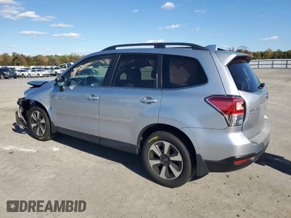 2017 Subaru Forester Limited with VIN JF2SJALC2HH407768, listed as a Copart auction lot 87364875 with 36,703 mi miles and Salvage title. Bid and sale history available at DreamBid. Image 2.