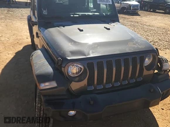 ✅ 2020 Jeep Wrangler Unlimited Sport • VIN: 1C4HJXDG4LW143969 • Lot: 86680385. Listed on Copart with 69,660 mi. Free auction sales archive from the USA and detailed vehicle history report at DreamBid. Image 14.