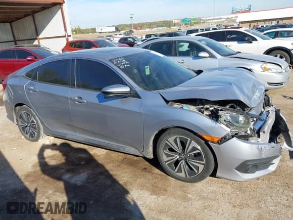 ✅ 2017 Honda Civic EX-T • VIN: 19XFC1F30HE005016 • Lot: 43641188. Listed on IAAI with 124,195 mi. Free auction sales archive from the USA and detailed vehicle history report at DreamBid. Image 13.
