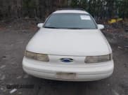 ✅ 1994 Ford Taurus GL • VIN: 1FALP57U4RG263732 • Lot: 43801365. Listed on IAAI with 141,636 mi. Free auction sales archive from the USA and detailed vehicle history report at DreamBid. Image 6.