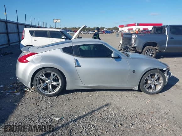 ✅ 2009 Nissan 370Z Touring • VIN: JN1AZ44EX9M403421 • Lot: 43590769. Listed on IAAI with 182,981 mi. Free auction sales archive from the USA and detailed vehicle history report at DreamBid. Image 14.