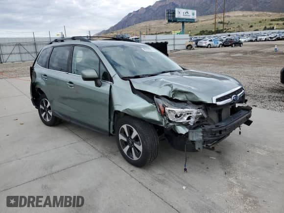 2018 Subaru Forester Limited with VIN JF2SJARC8JH586461, listed as a Copart auction lot 86336885 with 65,237 mi miles and Salvage title. Bid and sale history available at DreamBid. Image 4.