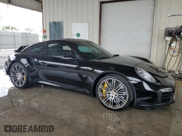 ✅ 2014 Porsche 911 Turbo • VIN: WP0AD2A95ES168052 • Lot: 74014314. Listed on Copart with 32,387 mi. Free auction sales archive from the USA and detailed vehicle history report at DreamBid. Image 4.