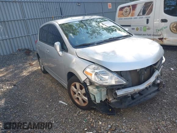 ✅ 2011 Nissan Versa S • VIN: 3N1BC1CP5BL373915 • Lot: 42933471. Listed on IAAI with 157,449 mi. Free auction sales archive from the USA and detailed vehicle history report at DreamBid. Image 1.