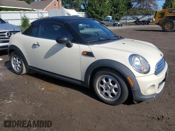 ✅ 2012 MINI Coupe • VIN: WMWSX1C52CT164027 • Lot: 74329124. Listed on Copart with Not provided. Free auction sales archive from the USA and detailed vehicle history report at DreamBid. Image 4.
