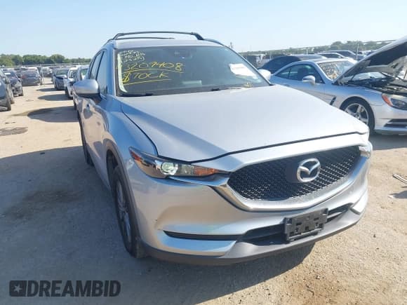 ✅ 2019 Mazda CX-5 Sport • VIN: JM3KFABM2K1562323 • Lot: 43209408. Wystawiony na IAAI z przebiegiem 74 031 mil. Bezpłatny archiwum sprzedaży aukcyjnych z USA i szczegółowy raport historii pojazdu na DreamBid. Zdjęcie 1.