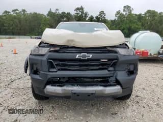 ✅ 2024 Chevrolet Colorado 4WD Trail Boss • VIN: 1GCPTEEKXR1107559 • Лот: 69709254. Опубликован ранее на Copart с пробегом Не указан. Бесплатный доступ к архиву аукционных продаж из США и подробный отчёт об истории автомобиля на DreamBid. Изображение 5.