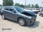 ✅ 2013 Mazda CX-5 Touring • VIN: JM3KE2CE7D0120985 • Lot: 42882325. Wystawiony na IAAI z przebiegiem 128 360 mil. Bezpłatny archiwum sprzedaży aukcyjnych z USA i szczegółowy raport historii pojazdu na DreamBid. Zdjęcie 1.