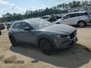 ✅ 2022 Mazda CX-30 S Carbon Edition • VIN: 3MVDMBCL8NM414346 • Лот: 71610055. Опубликован ранее на Copart с пробегом Не указан. Бесплатный доступ к архиву аукционных продаж из США и подробный отчёт об истории автомобиля на DreamBid. Изображение 14.
