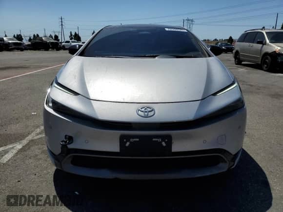 2024 Toyota Prius LE с VIN JTDACAAU3R3017518, выставлен на аукционе Copart как лот 70948625 с пробегом 51 151 миль миль и Списание • Salvage title. История ставок и продаж доступна на DreamBid. Изображение 5.
