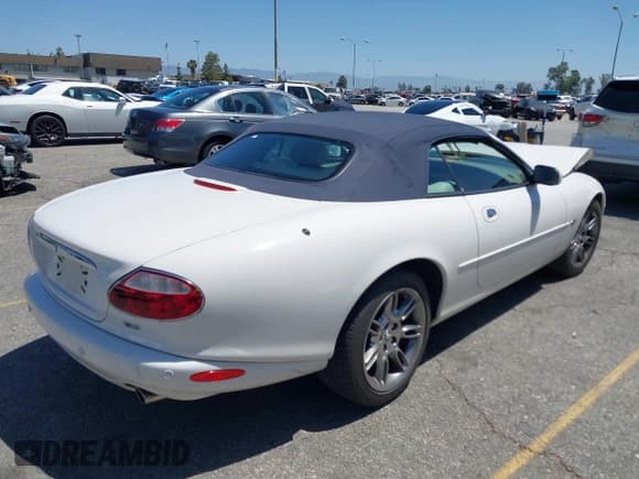 ✅ 2001 Jaguar XK • VIN: SAJDA42C51NA16264 • Lot: 42259534. Listed on IAAI with 68,950 mi. Free auction sales archive from the USA and detailed vehicle history report at DreamBid. Image 4.