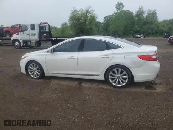 ✅ 2014 Hyundai Azera Limited • VIN: KMHFH4JG3EA379188 • Лот: 62874875. Опубликован ранее на Copart с пробегом 169 645 миль. Бесплатный доступ к архиву аукционных продаж из США и подробный отчёт об истории автомобиля на DreamBid. Изображение 2.