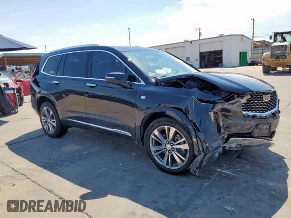 ✅ 2024 Cadillac XT6 FWD Premium Luxury • VIN: 1GYKPCRSXRZ733699 • Lot: 68761595. Listed on Copart with 1,765 mi. Free auction sales archive from the USA and detailed vehicle history report at DreamBid. Image 4.