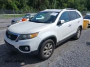 ✅ 2011 Kia Sorento LX • VIN: 5XYKTCA1XBG140577 • Lot: 42979537. Listed on IAAI with 198,805 mi. Free auction sales archive from the USA and detailed vehicle history report at DreamBid. Image 2.
