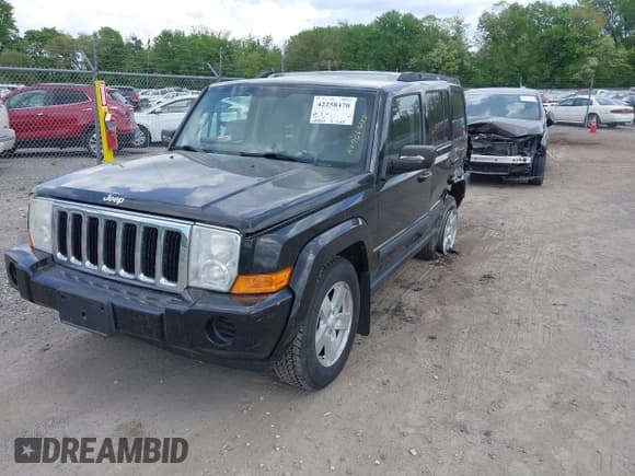 ✅ 2007 Jeep Commander Sport • VIN: 1J8HG48K07C669222 • Lot: 42258470. Listed on IAAI with 205,865 mi. Free auction sales archive from the USA and detailed vehicle history report at DreamBid. Image 2.