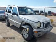 ✅ 2002 Jeep Liberty Sport • VIN: 1J4GK48KX2W265914 • Lot: 42963543. Listed on IAAI with 171,471 mi. Free auction sales archive from the USA and detailed vehicle history report at DreamBid. Image 1.