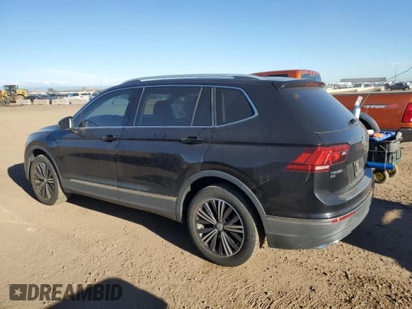 ✅ 2018 Volkswagen Tiguan SEL • VIN: 3VV3B7AX3JM013448 • Лот: 80817405. Опубликован ранее на Copart с пробегом 124 346 миль. Бесплатный доступ к архиву аукционных продаж из США и подробный отчёт об истории автомобиля на DreamBid. Изображение 2.