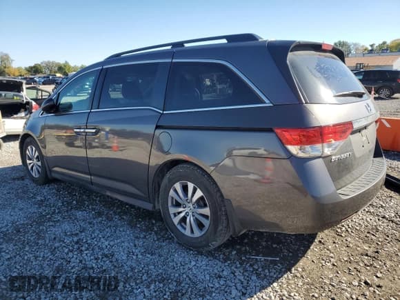 ✅ 2016 Honda Odyssey EX-L • VIN: 5FNRL5H65GB032216 • Lot: 82480015. Listed on Copart with 103,343 mi. Free auction sales archive from the USA and detailed vehicle history report at DreamBid. Image 2.