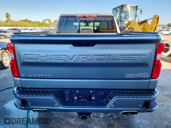 2020 Chevrolet Silverado 1500 High Country z VIN 1GCUYHEL5LZ183780, wystawiony jako Copart lot #91276325 z przebiegiem Nie podano mil oraz Szkoda całkowita • Salvage title. Historia ofert i sprzedaży dostępna na DreamBid. Obrazek 6.