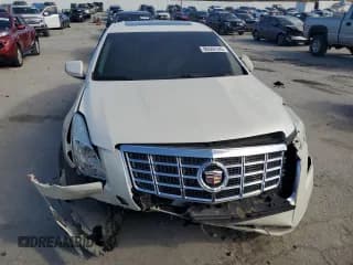 ✅ 2013 Cadillac XTS Luxury • VIN: 2G61P5S31D9193729 • Лот: 90502345. Опубликован ранее на Copart с пробегом 101 674 миль. Бесплатный доступ к архиву аукционных продаж из США и подробный отчёт об истории автомобиля на DreamBid. Изображение 5.